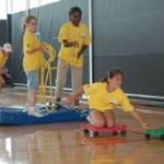 Yellow campers working at the Challenge Course